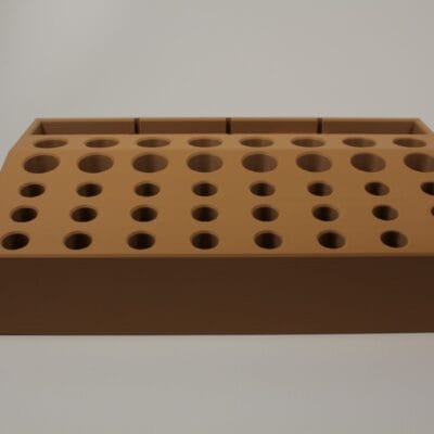 Front view of Hideout Craft modular leather tool holder in wood finish