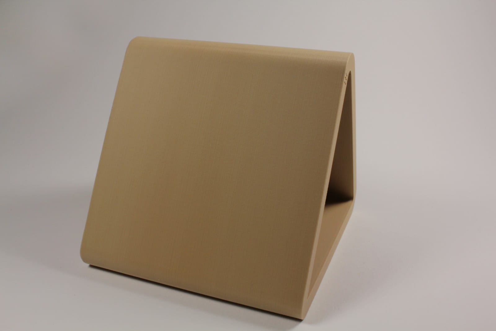 Side view of Hideout strap bending jig showing progressive bend profile