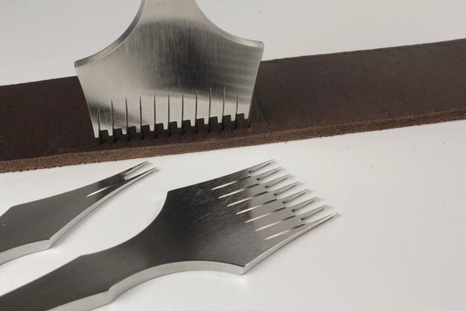 Kevin Lee 3.85mm 12-tooth French style pricking iron in leather