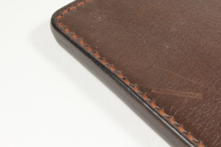 Hand stitched leather seam with 3.85mm stitch spacing on vegetable tanned leather