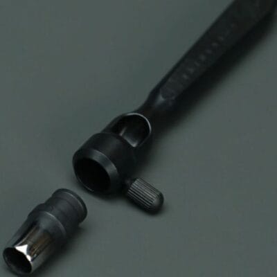 Handle for interchangeable leather punch bits