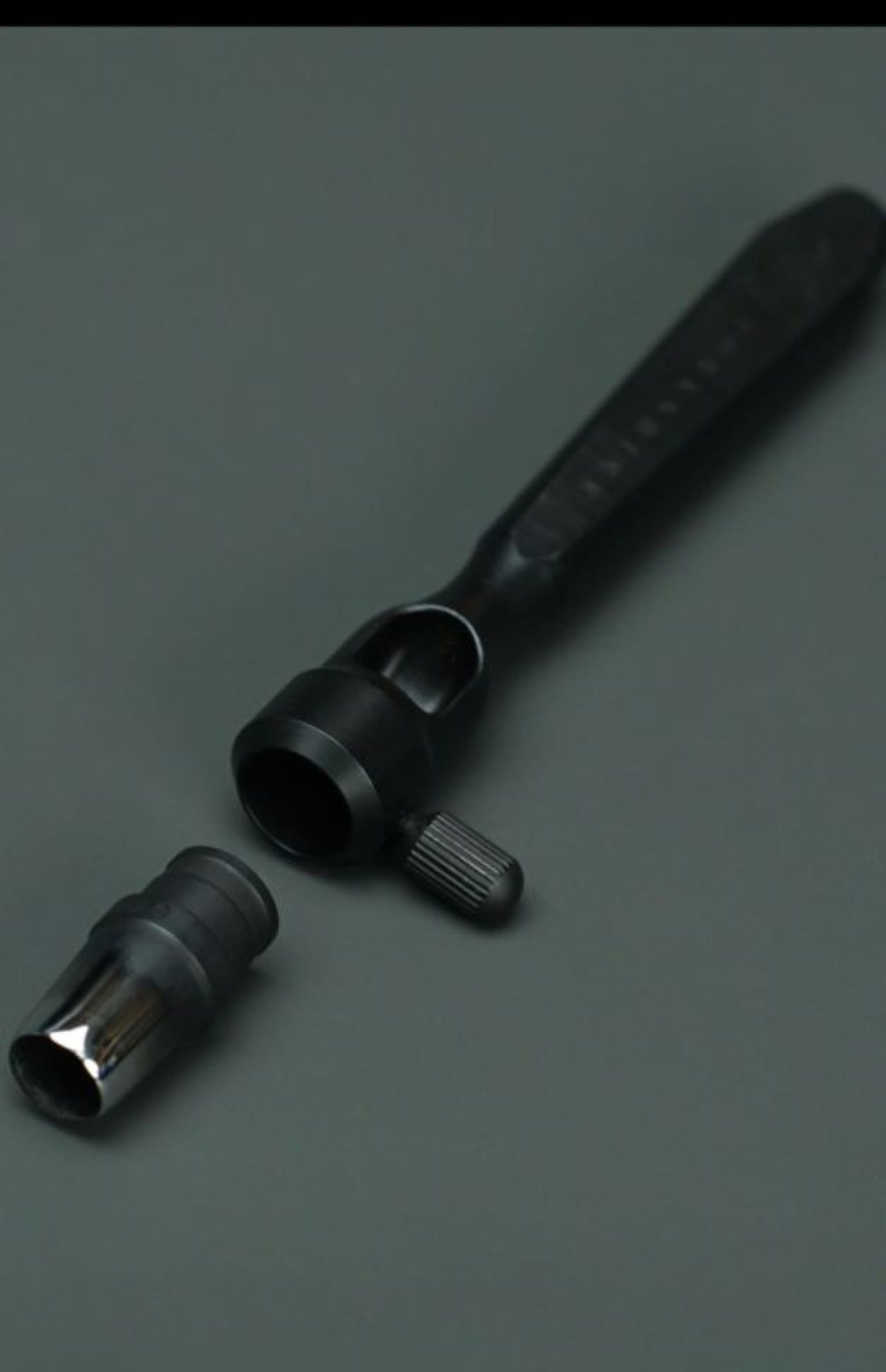 Handle for interchangeable leather punch bits