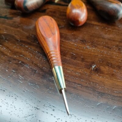 Close-up of leathercraft French awl blade and handle