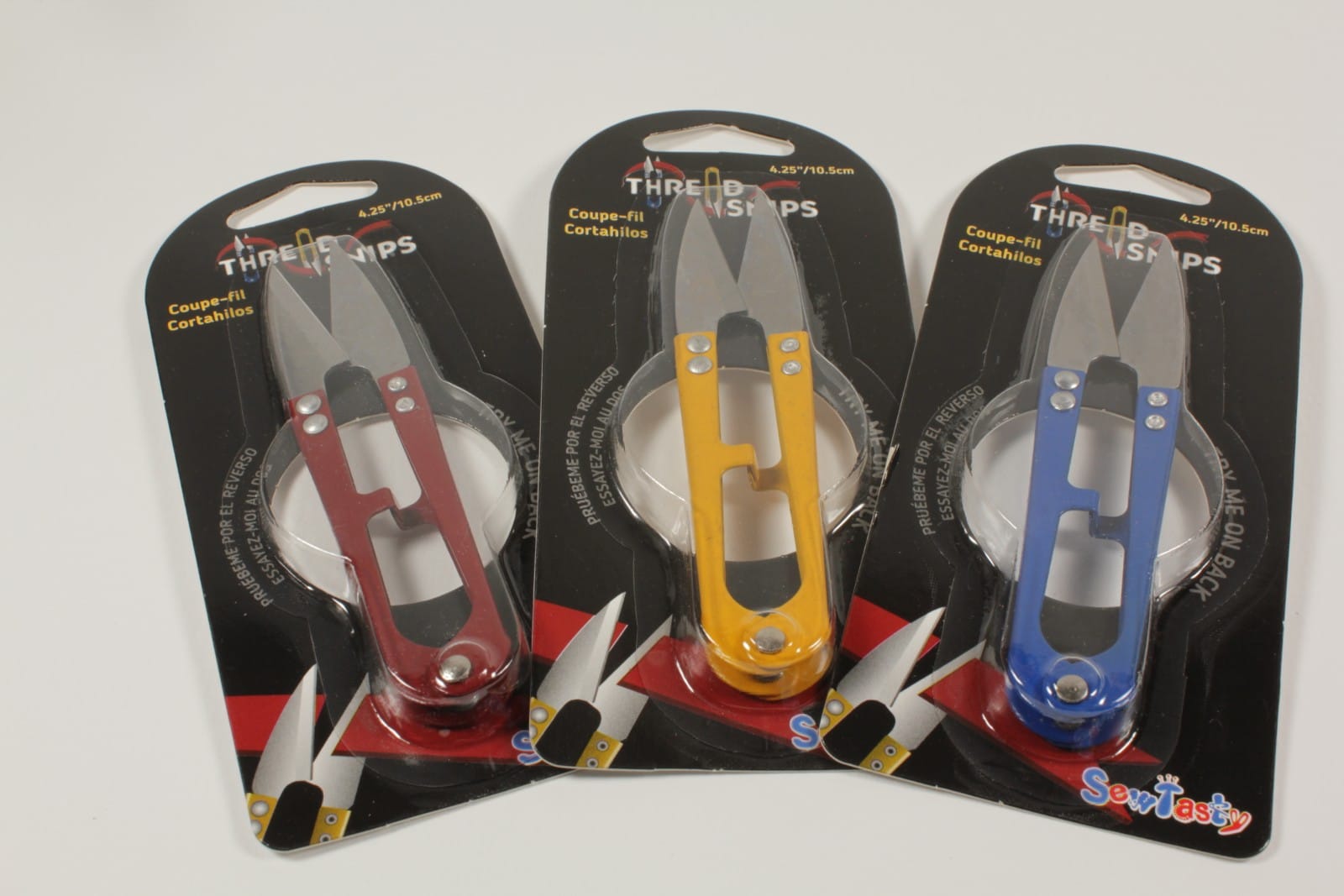 Leathercraft thread snips in burgundy yellow and blue retail packaging