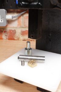 M8 ram adapter, M8 to M5 reducer insert, and leather logo stamp components for arbor press use.