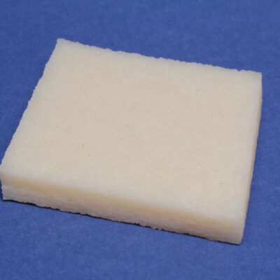 Natural rubber eraser for removing dried contact adhesive from leather
