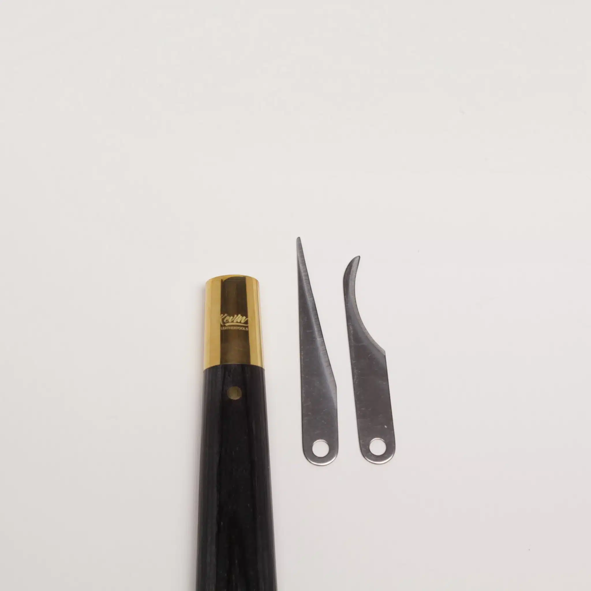 Kevin Lee pattern knife handle shown with both straight and curved blades