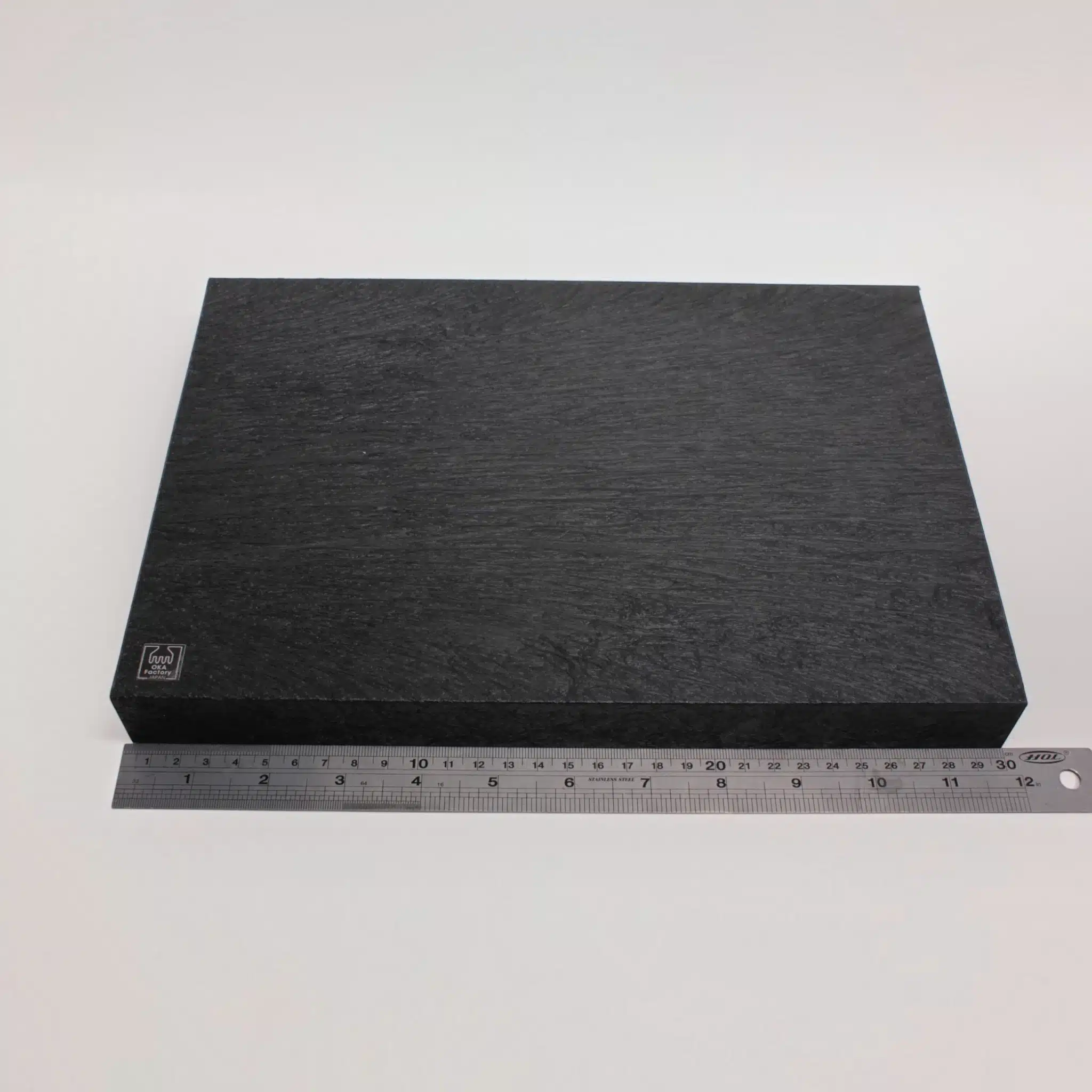OKA cutting and punching board 200 x 300mm shown for size reference