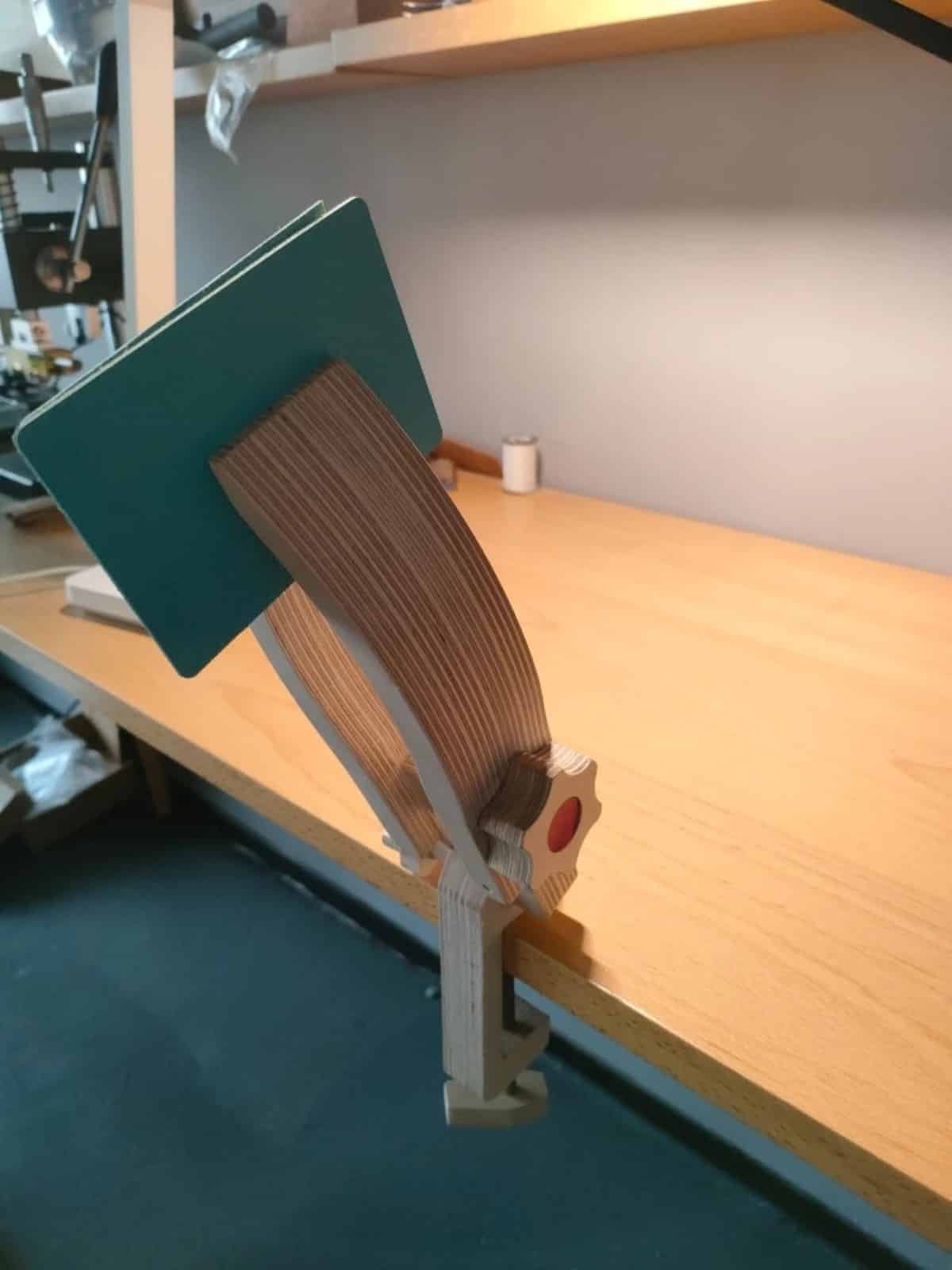 Side view of the Kevin Lee 45mm curved-jaw stitching pony mounted to a workbench