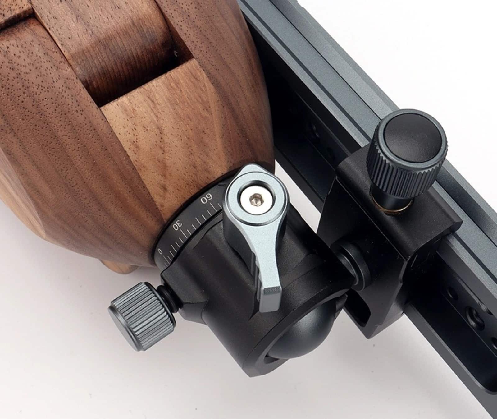Close-up of the adjustable metal mounting mechanism on the Kevin Lee liftable stitching pony